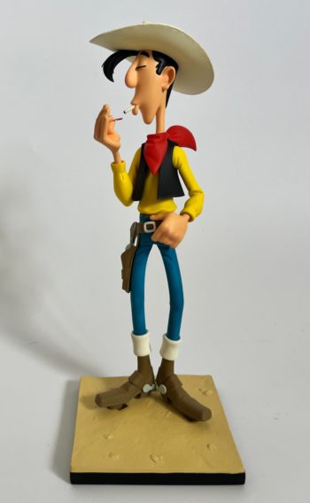 Morris - Lucky Luke - Figurine Lucky Luke allumant sa cigarette - LMZ Collectibles - 2024